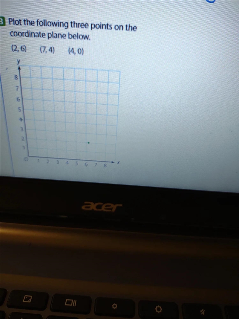 Plot the following three points on the coordinate plane below.-example-1