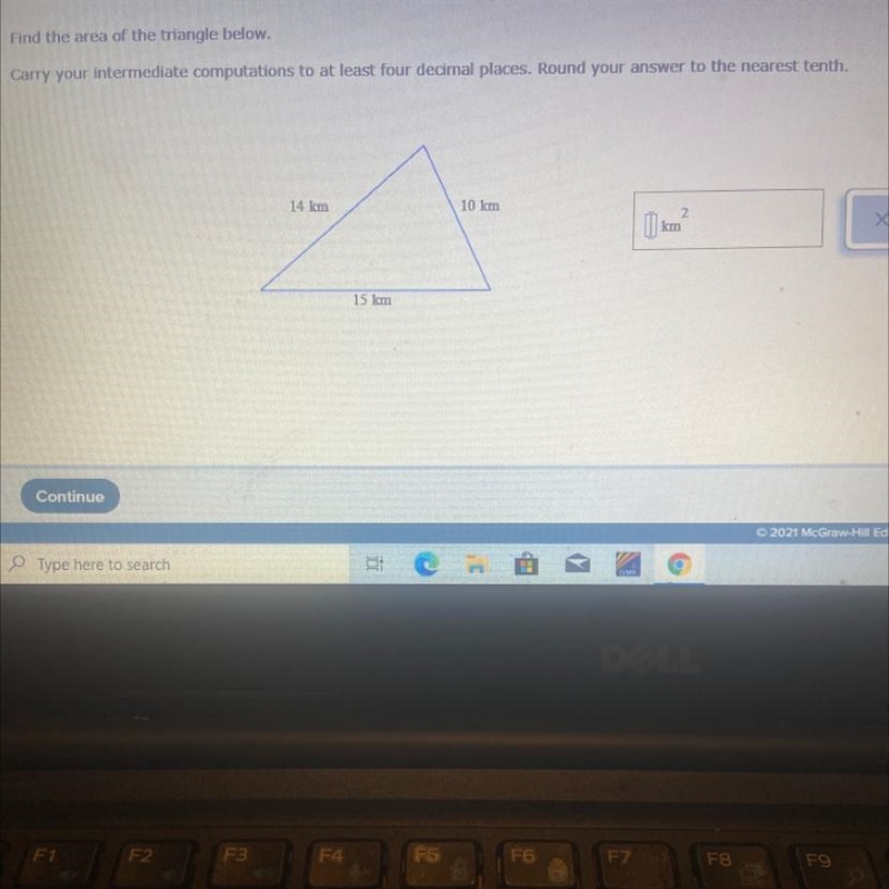 Find the area of the triangle below.Carry your intermediate computations to at least-example-1