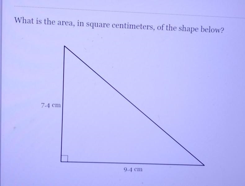 What is the area, in square centimeters, of the shape below? 7.4 cm 9.4 cm​-example-1