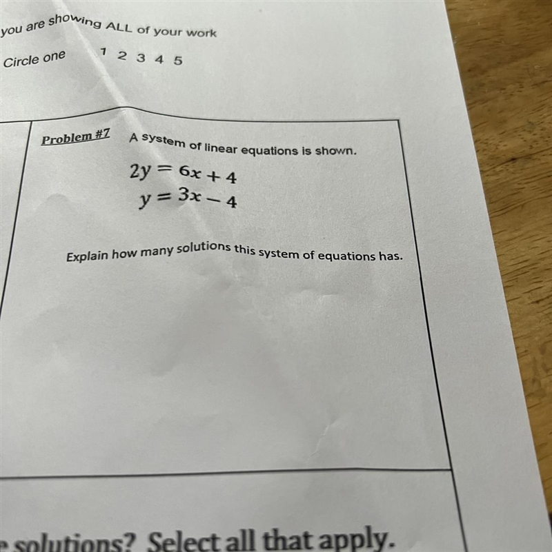 Explain how many solutions this system of equations has.-example-1