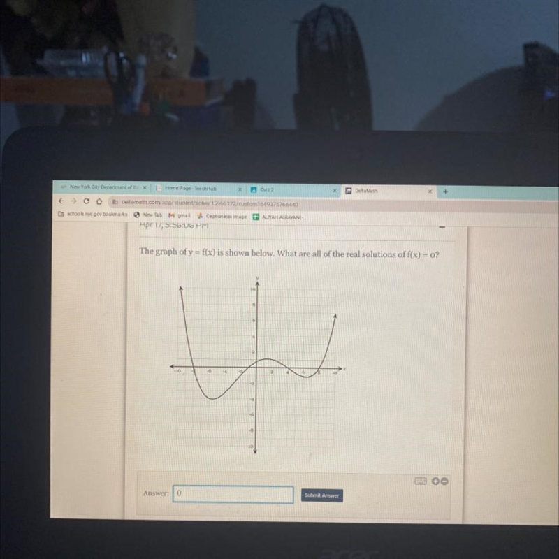 The graph of y = f(x) is shown below. What are all of the real solutions of f(x) = 0?-example-1