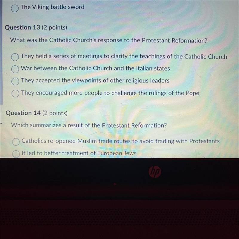 What was the Catholic Church's response to the Protestant Reformation? They held a-example-1