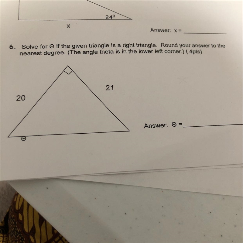 Solve for o if the given triangle is a right triangle. Round your answer to the nearest-example-1