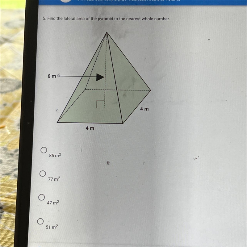 HELP!! Find the lateral area of the pyramid to the nearest whole number 85 m2 77 m-example-1