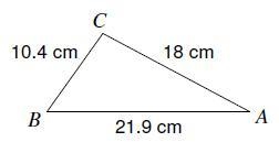 Solve each triangle. Round answers to the nearest tenth.-example-1