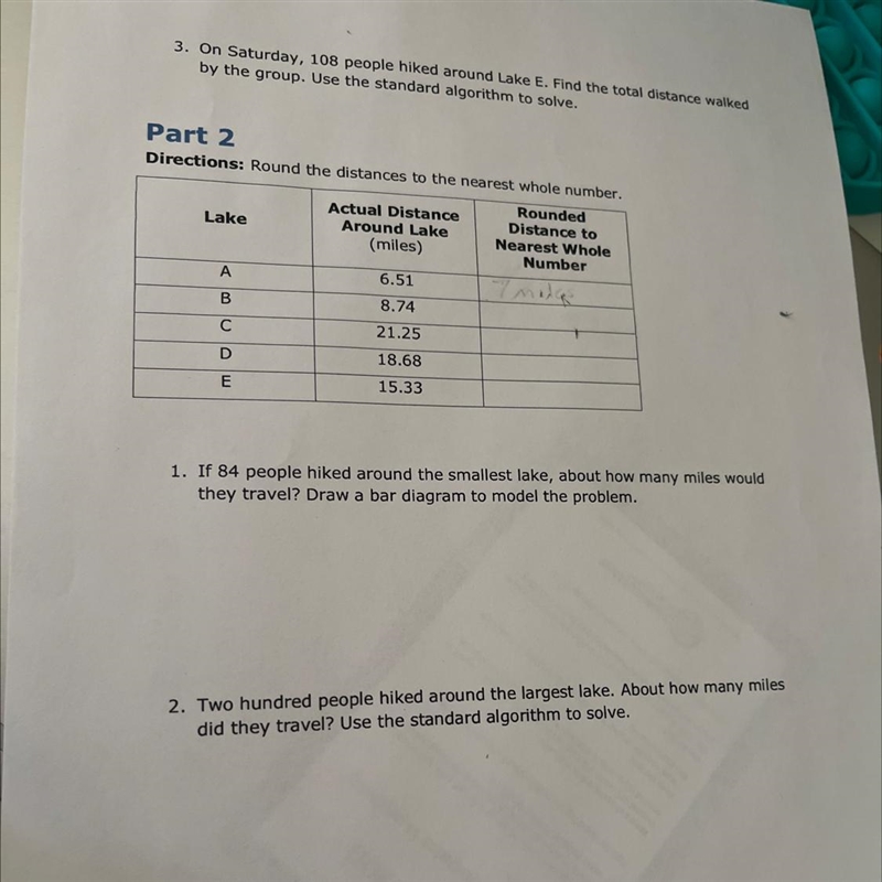 On Saturday, 108 people hiked around Lake E. Find the total distance walked by the-example-1