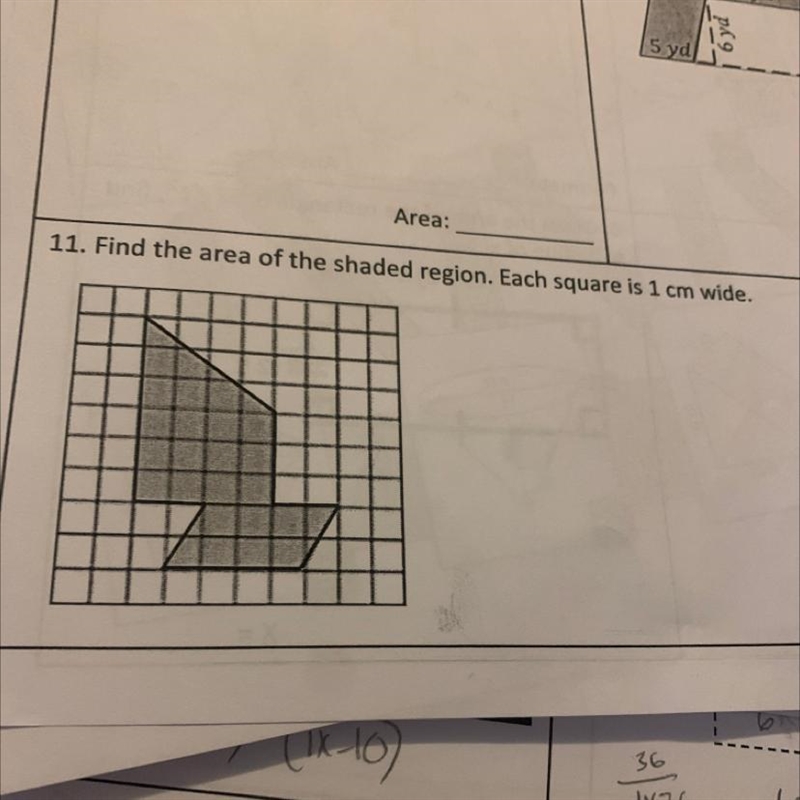 11. Find the area of the shaded region. Each square is 1 cm wide.-example-1