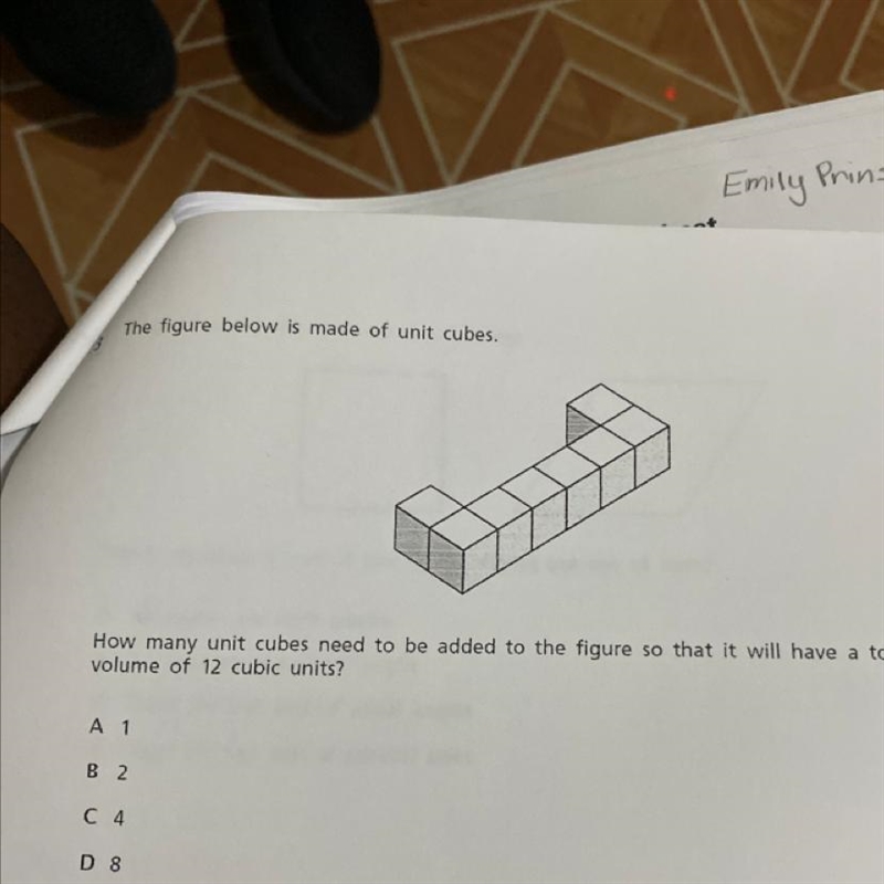 How many unit cubes need to be added to the figure so that it will have a total volume-example-1