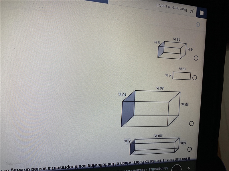 Carrie drew a scaled drawing of her fish tank below. If her fish tank is similar to-example-2