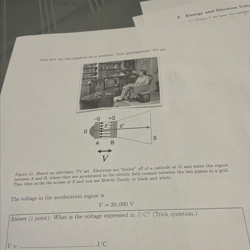 Voltage at region is V= 20,000 V. What is the voltage expressed in J/C? The kinetic-example-1