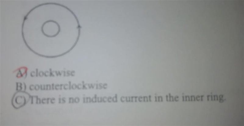 An outer metal ring surrounds an inner metal ring, as shown in the figure. The current-example-1