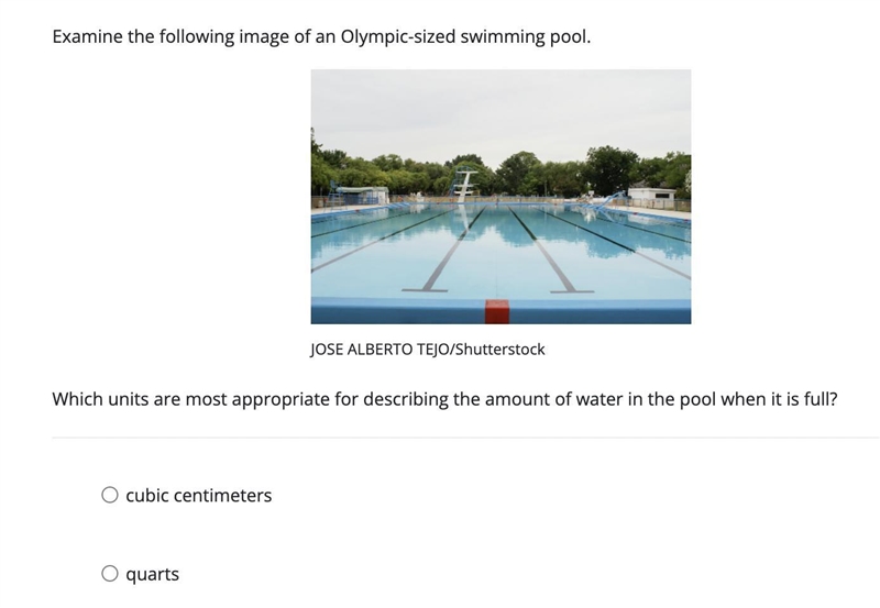 Examine the following image of an Olympic-sized swimming pool. An outdoor Olympic-example-1