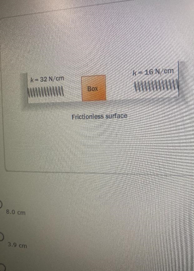 A 1.5 kg box moves back and forth on a horizontal frictionless surface between two-example-1