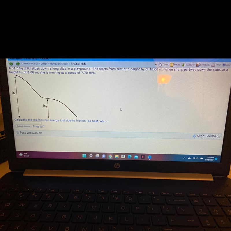 A 31.0kg child slides down a long slide in a playground. She starts from test at a-example-1