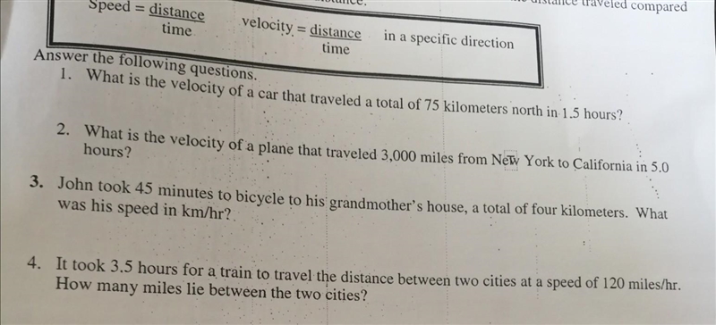 Answer the following questions. 1. What is the velocity of a car that traveled a total-example-1