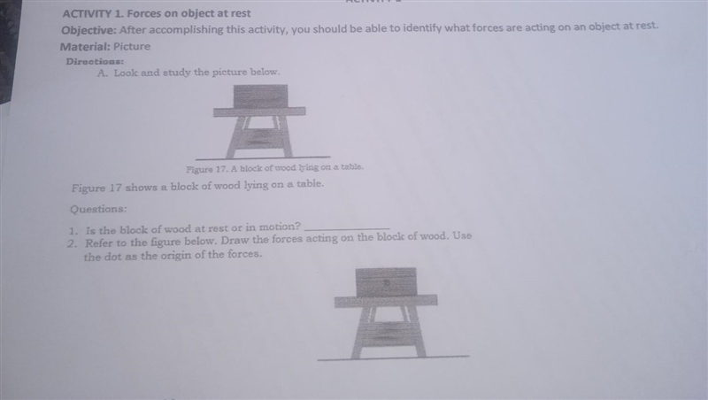 Please someone help me. is the block of wood at rest or in motion? refer to the figure-example-1