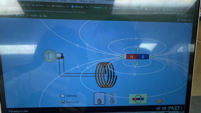 What happens as you move the north side of the magnet into the coil?-example-1