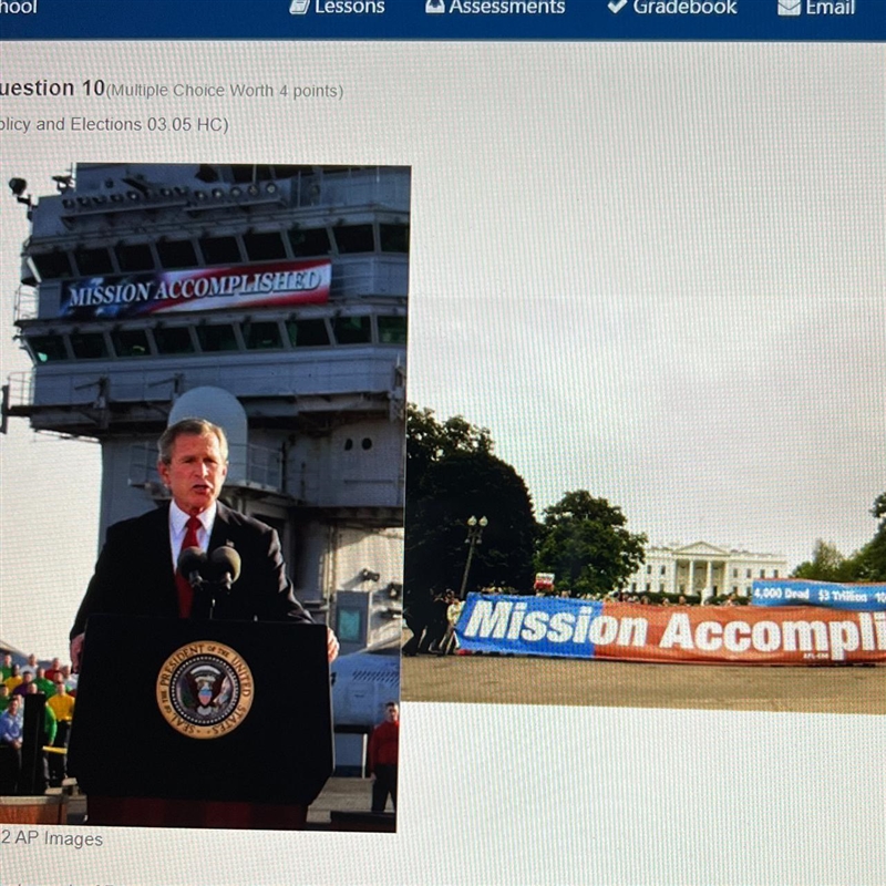 The photograph of President George W. Bush was taken in 2003 as he gave a speech announcing-example-1