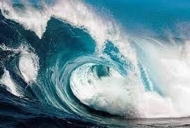 What causes waves to occur in the ocean?-example-1