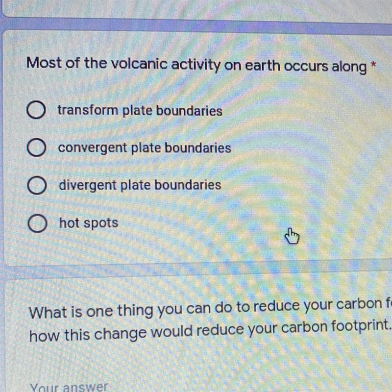 Most volcanic activity on the earth occurs along what?-example-1