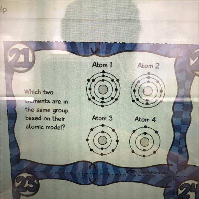 Which two elements are in the same group based on their atomic model? Please help-example-1