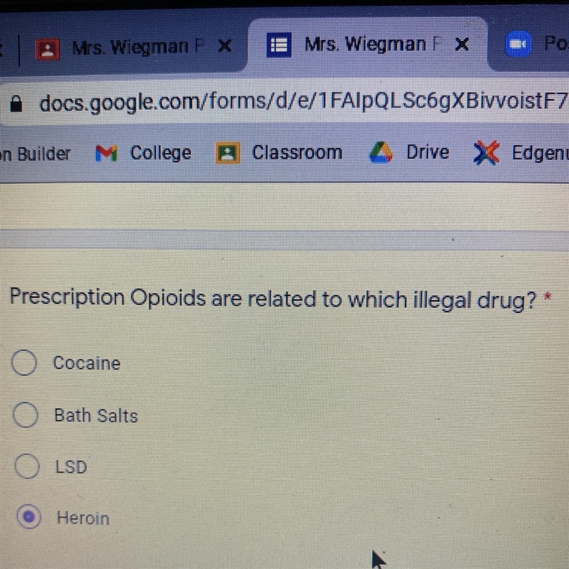 Prescription opioids are related to which illegal drug? a.) Cocaine b.) Bath Salts-example-1