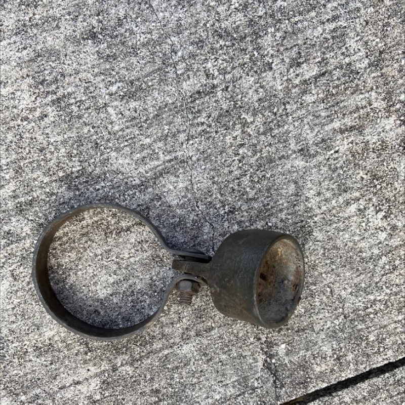 What is this metal ring with a bell looking thing on the end?-example-1