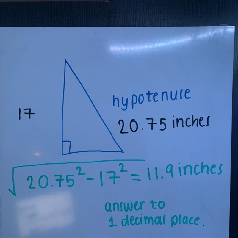 The hypotenuse of a triangle measures 20.75 in., and one of the legs measures 17 in-example-1