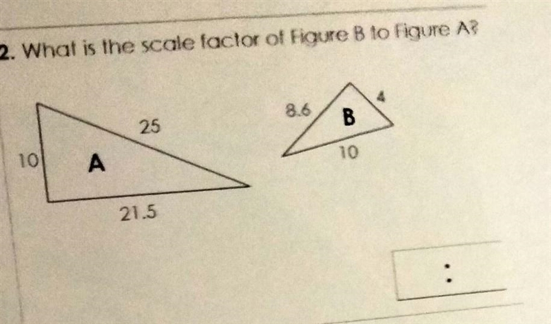 What is the scale factor of Figure B to Figure A?​-example-1