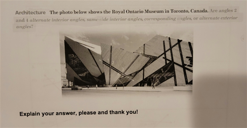 The photo below shows the Royal Ontario Museum in Toronto, Canada. Are angles 2 and-example-1