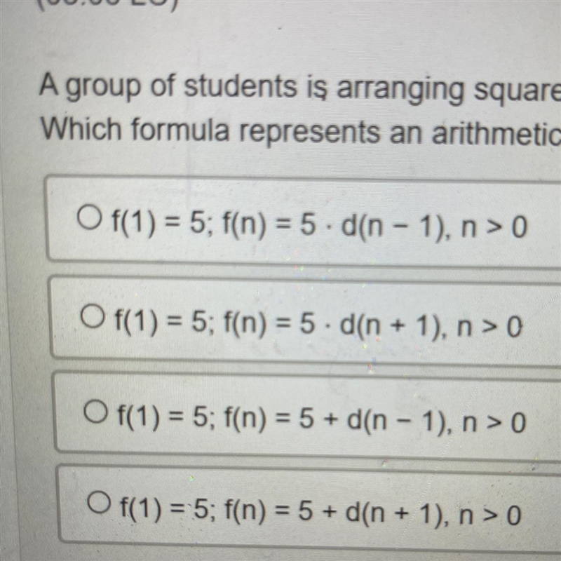 A group of students is arranging squares into layers to create a project. The first-example-1