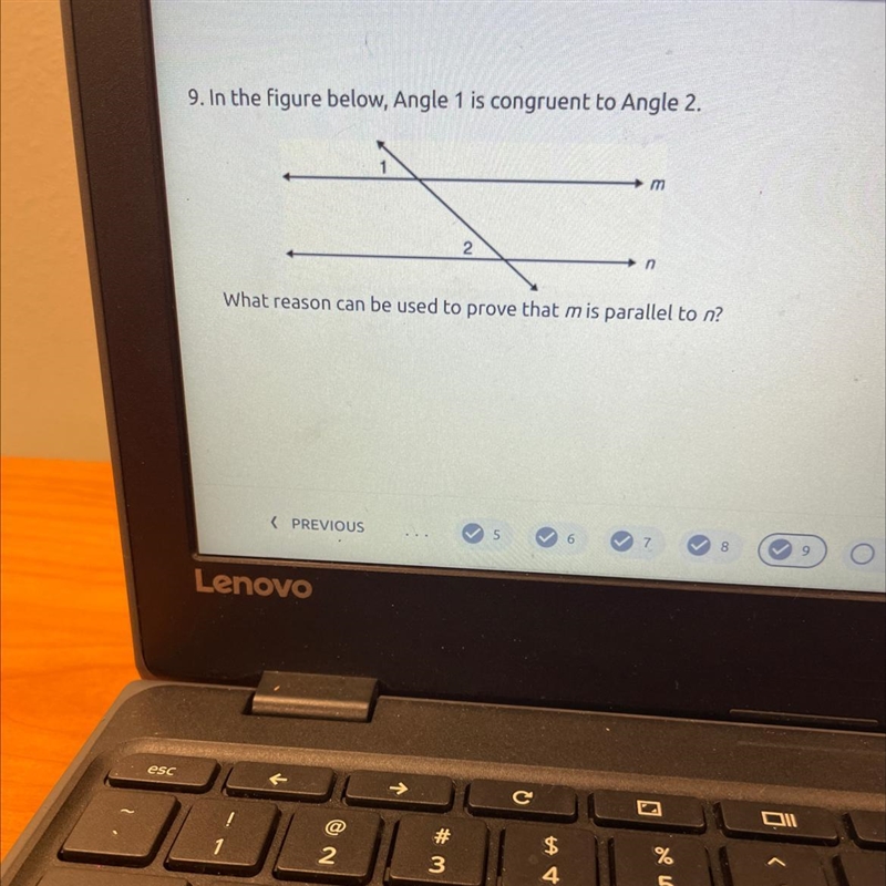 9. In the figure below, Angle 1 is congruent to Angle 2. What reason can be used to-example-1