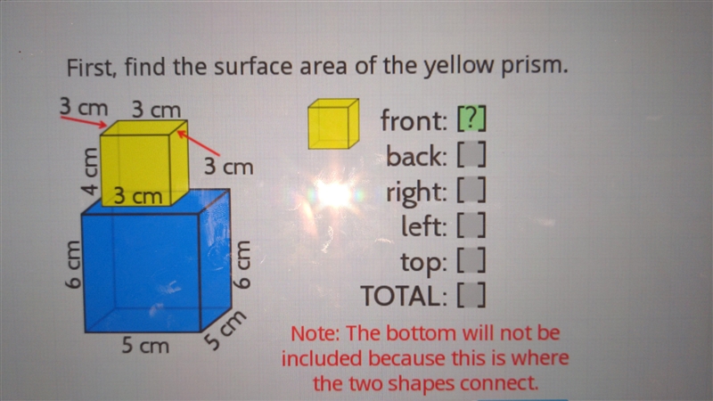 First, find the surface area of the yellow prism-example-1