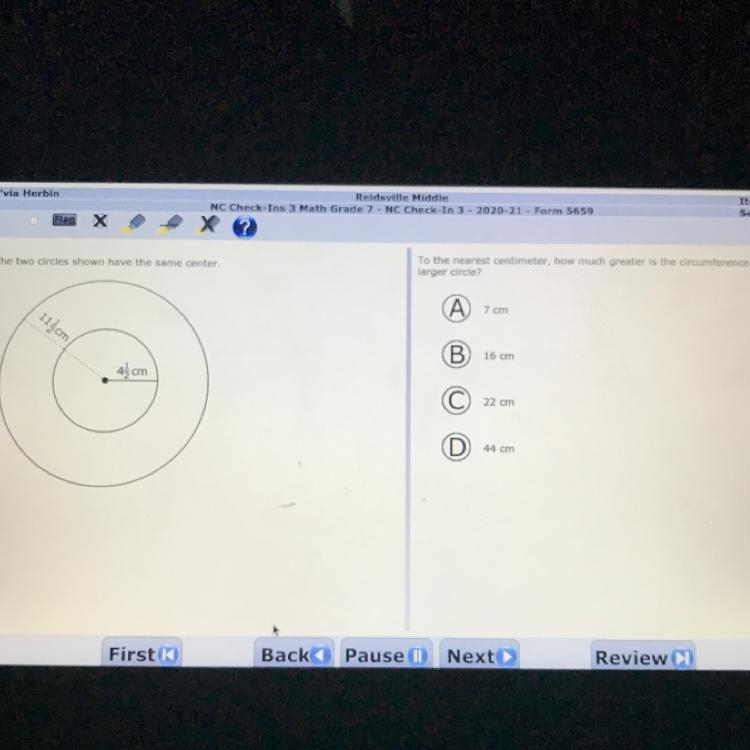 The two circles shown have the same center To the nearest centimeter, how much greater-example-1