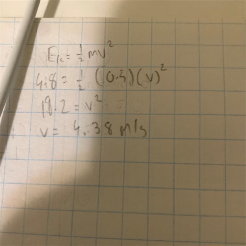 The kinetic energy of a particle of mass 500g is 4.8j. Determine the velocity of the-example-1