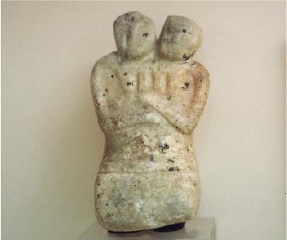 The image shows a piece of art found at the Catal Huyuk site in Turkey. Why is it-example-1