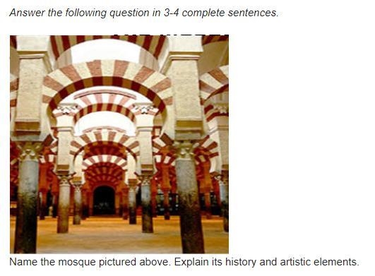 Name the mosque pictured above. Describe the artistic elements and purpose of this-example-2