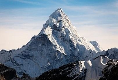 Which force most likely created this mountain? compression gravity shearing tension-example-1