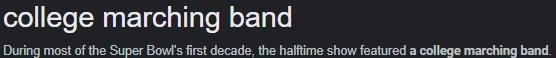 The first super bowl halftime shows featured what kind of musical act?.-example-1