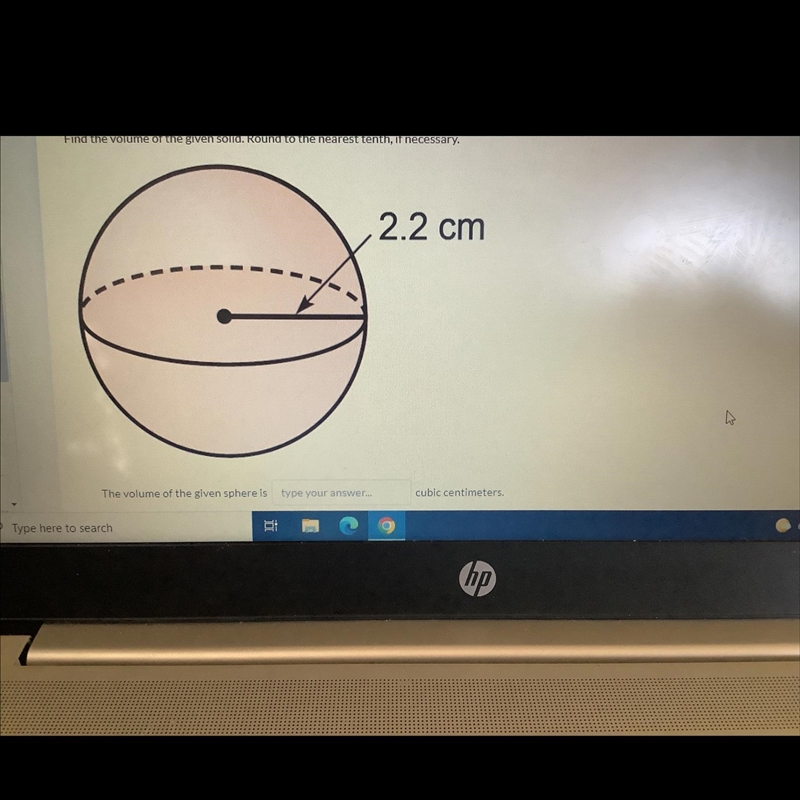 Find the volume of the given solid. Round to the nearest 10th, if necessary.-example-1