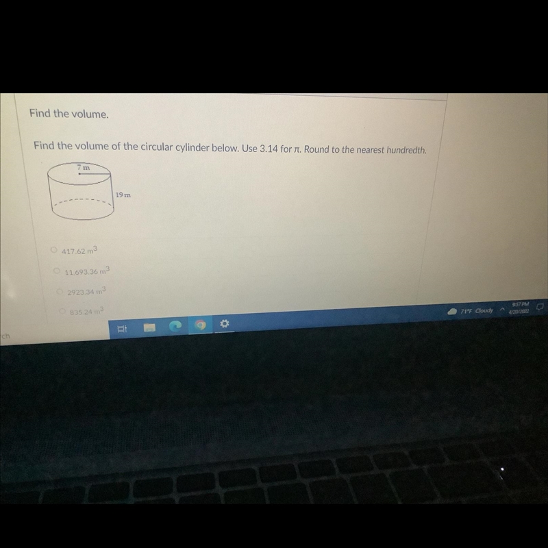 Find the volume of the circular cylinder below. Use 3.14 for pie. Round to the nearest-example-1