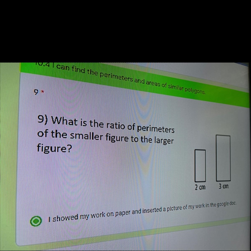 9) What is the ratio of perimetersof the smaller figure to the largerfigure?-example-1