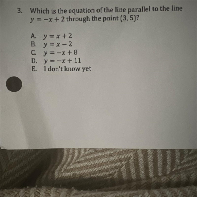 Which is the equation of the line parallel to the line y=-x + 2 through the point-example-1