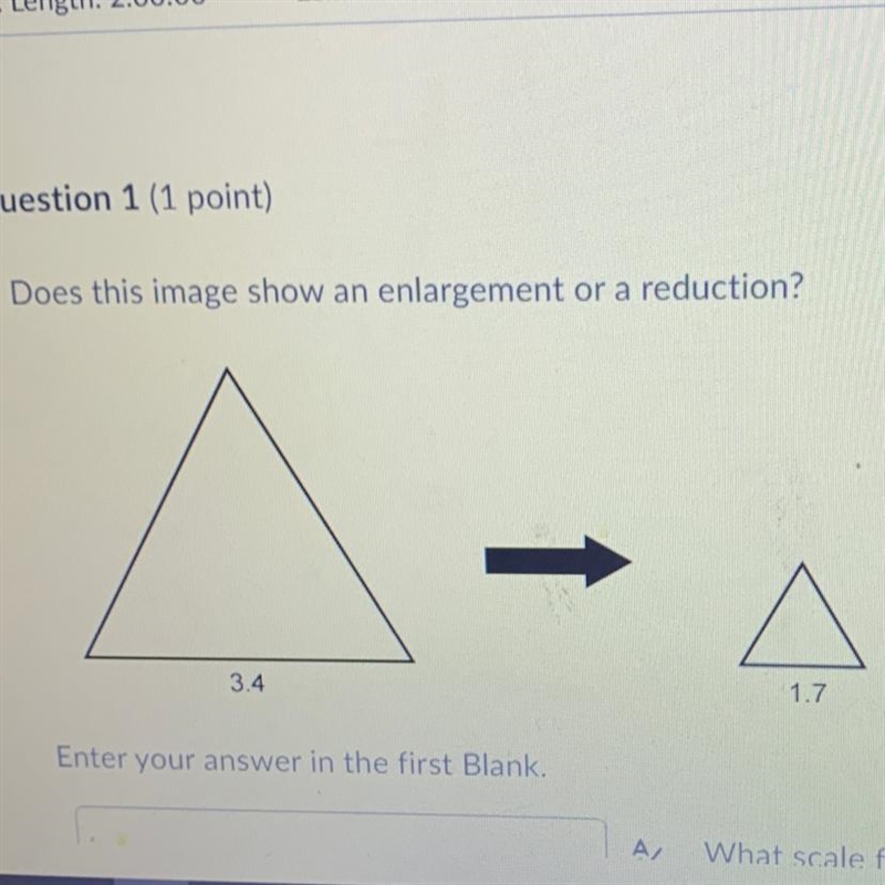 Does this image show an enlargement or a reduction? 17 Enter your answer in the first-example-1