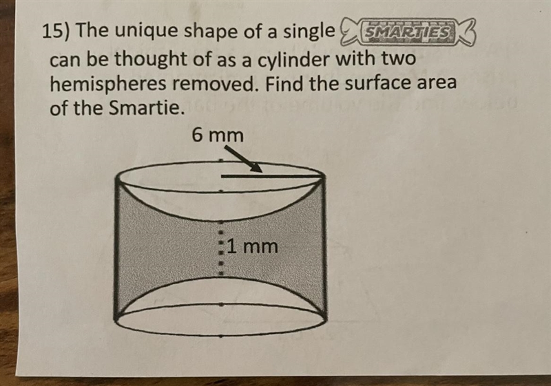 The unique shape of a single smarties can be thought of as a cylinder with two hemispheres-example-1