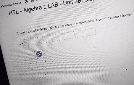 7. Given the table below, identify the slope in simplest form. Use "/" to-example-1