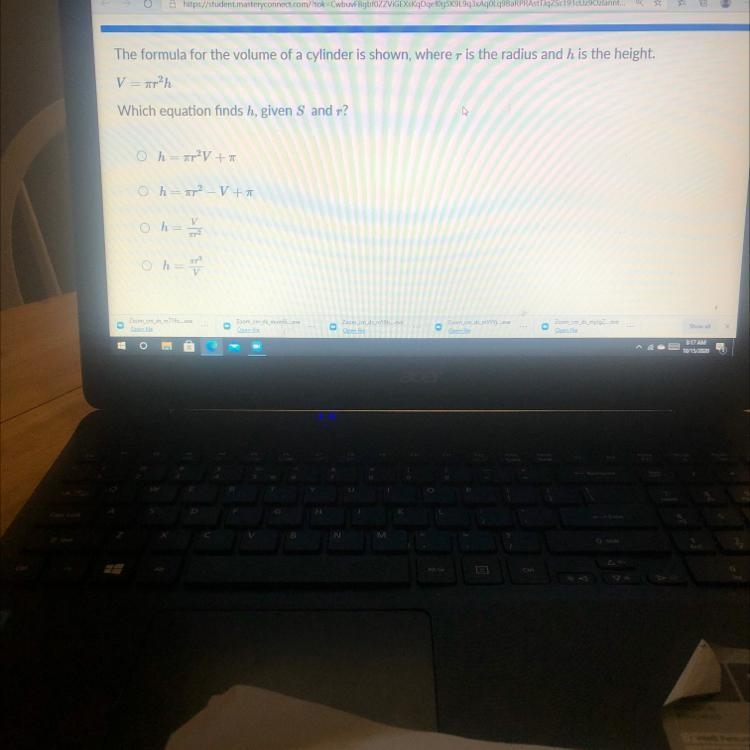 The formula for the volume of a cylinder is shown, where r is the radius and h is-example-1