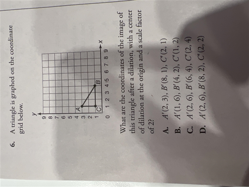 A triangle is graphed on the coordinate grid below. What are the coordinates of the-example-1