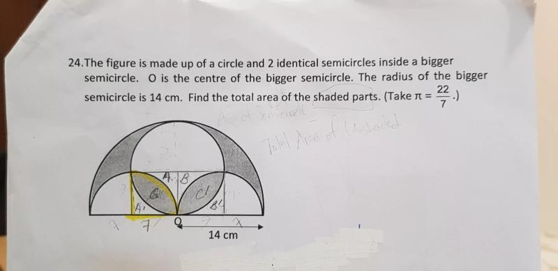 24. The figure is made up of a circle and 2 identical semicircles inside a bigger-example-1