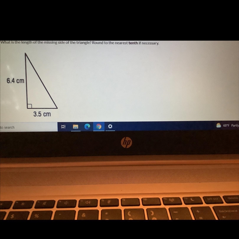 What is the length of the missing side of the triangle rounds the nearest 10th necessary-example-1